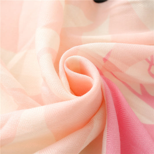 Close-up of pink and peach fabric with a soft texture