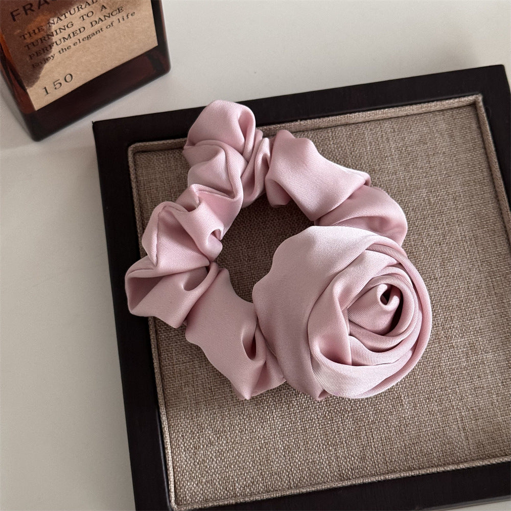 French-style satin scrunchie with rose-inspired design for women
Vintage large hair ring for ponytails, buns, and wrist wear
Soft luxurious satin scrunchie preventing hair breakage
Voluminous French scrunchie adding elegance to casual and formal looks