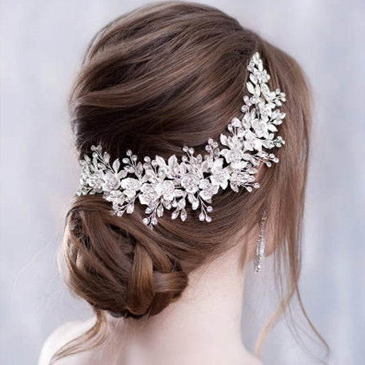 Elegant bridal headband silver crystal wedding hair accessory
Gold wedding headband for bride formal hairstyle accessory
Woman wearing bridal hairband for wedding hairstyle
Alloy headband for special occasions and bridal look