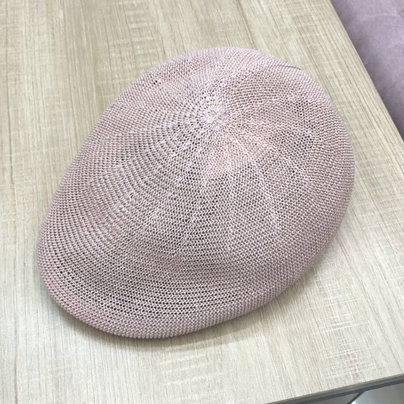 Hand-hooked Korean short brim peaked cap in beige on white background
