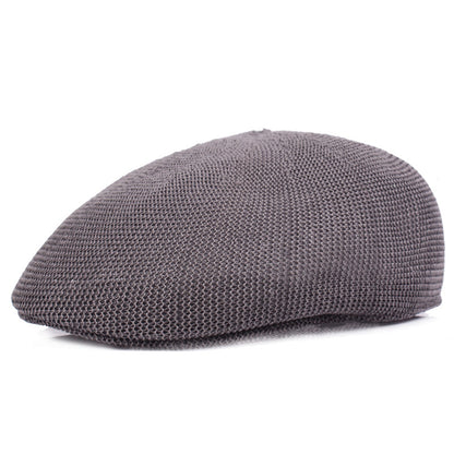 Hand-hooked Korean short brim peaked cap in beige on white background