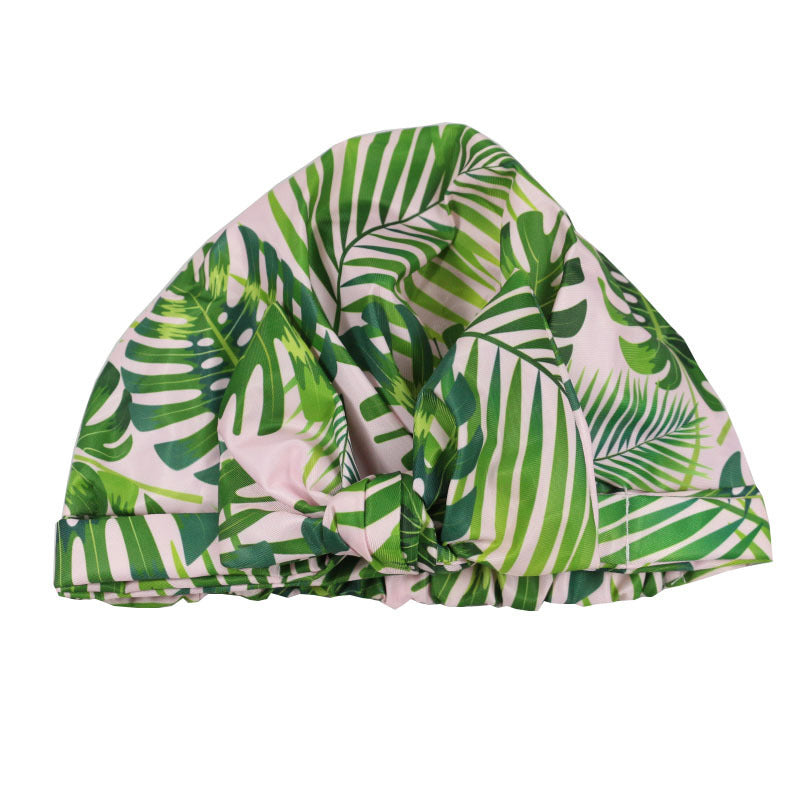 Women’s waterproof shower cap with striped print design
Stylish printed shower cap protecting hair from water
Oxford cloth shower cap with floral and tropical patterns
Comfortable waterproof hair cap with secure fit for adults