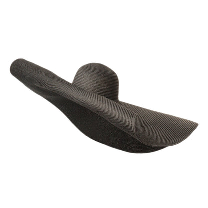  Close-up of warp-knit straw texture on a large-brim women's fashion hat in neutral black