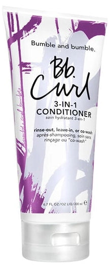 A squeeze tube of Bb. Curl 3-In-1 Conditioner by Bumble and bumble, featuring a white tube with purple paint splatter graphics and black text.