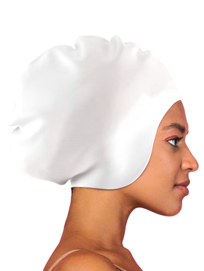 White towel wrapped around a person's head on a white background
