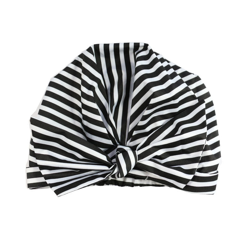 Women’s waterproof shower cap with striped print design
Stylish printed shower cap protecting hair from water
Oxford cloth shower cap with floral and tropical patterns
Comfortable waterproof hair cap with secure fit for adults