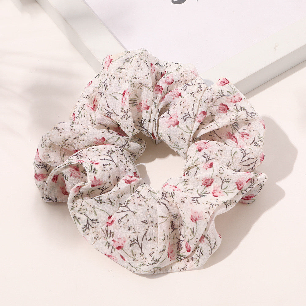 Soft satin or delicate chiffon, these large hair ties add effortless style while keeping hair secure and damage-free.