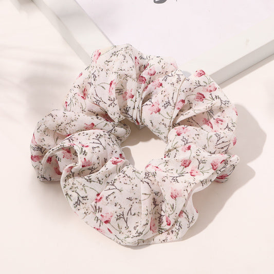 Soft satin or delicate chiffon, these large hair ties add effortless style while keeping hair secure and damage-free.