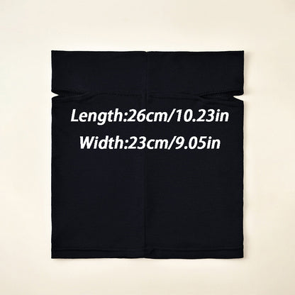 Black fabric with measurements printed on a beige background