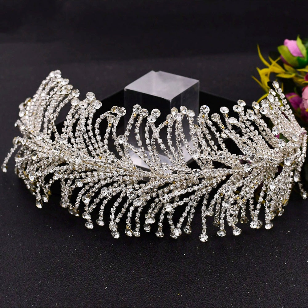 Handmade rhinestone silk hair chain with tassel design
Gold crystal hair accessory with S-shaped arc style
Silver rhinestone headpiece with flowing tassels
Statement hair jewelry for women street style fashion