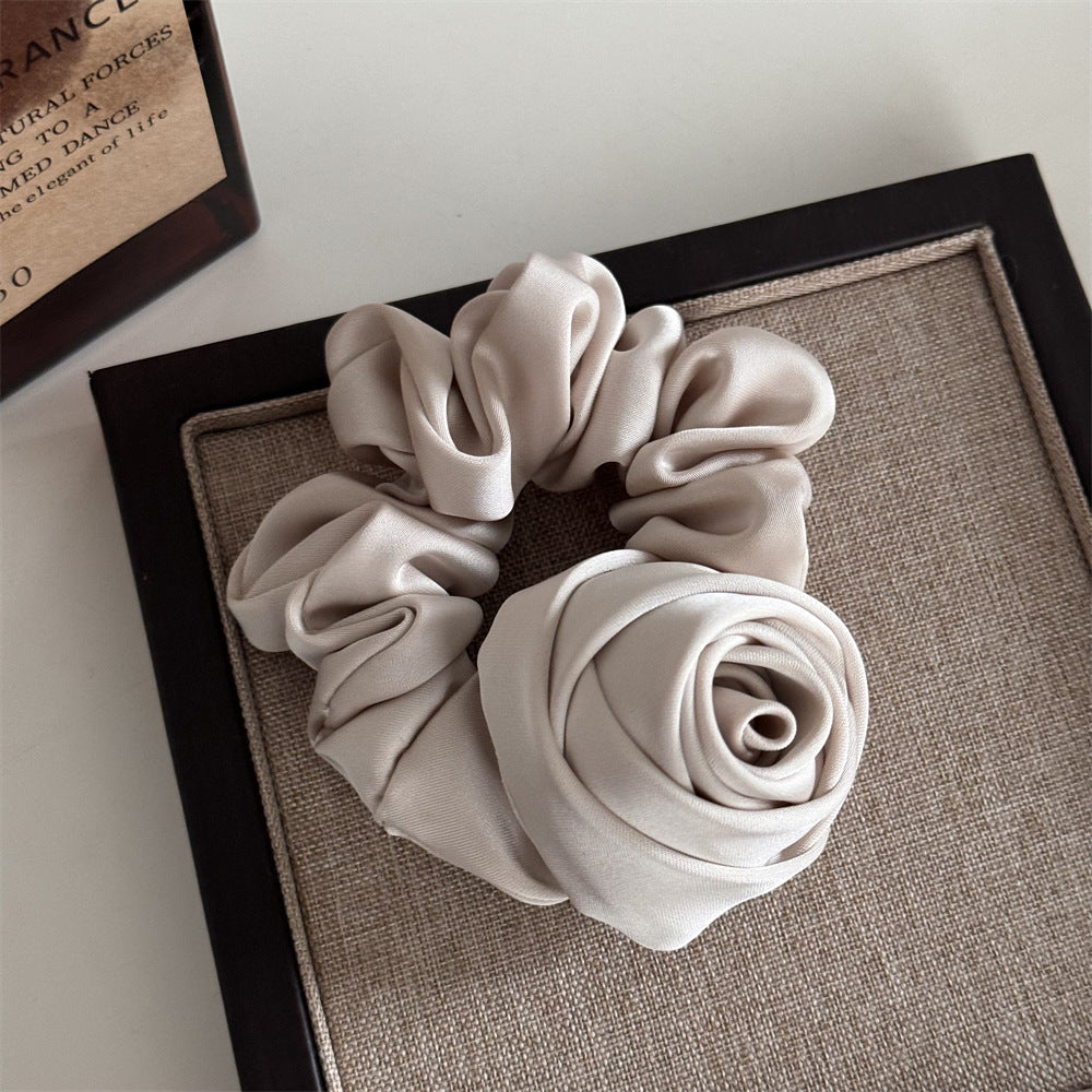 French-style satin scrunchie with rose-inspired design for women
Vintage large hair ring for ponytails, buns, and wrist wear
Soft luxurious satin scrunchie preventing hair breakage
Voluminous French scrunchie adding elegance to casual and formal looks