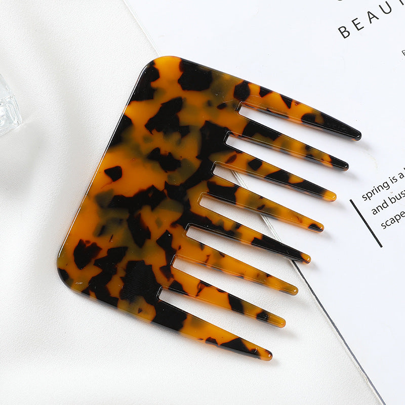 Tortoiseshell patterned hair comb on a white background - Marble-finish cellulose acetate hair comb, anti-static and gentle on hair